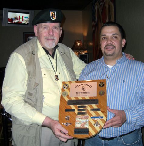 Jim Duffy Presenting Plaque to Manager Dean Alfaro at Toby Keith\'s Bar & Grill