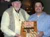 Jim Duffy Presenting Plaque to Manager Dean Alfaro at Toby Keith\'s Bar & Grill