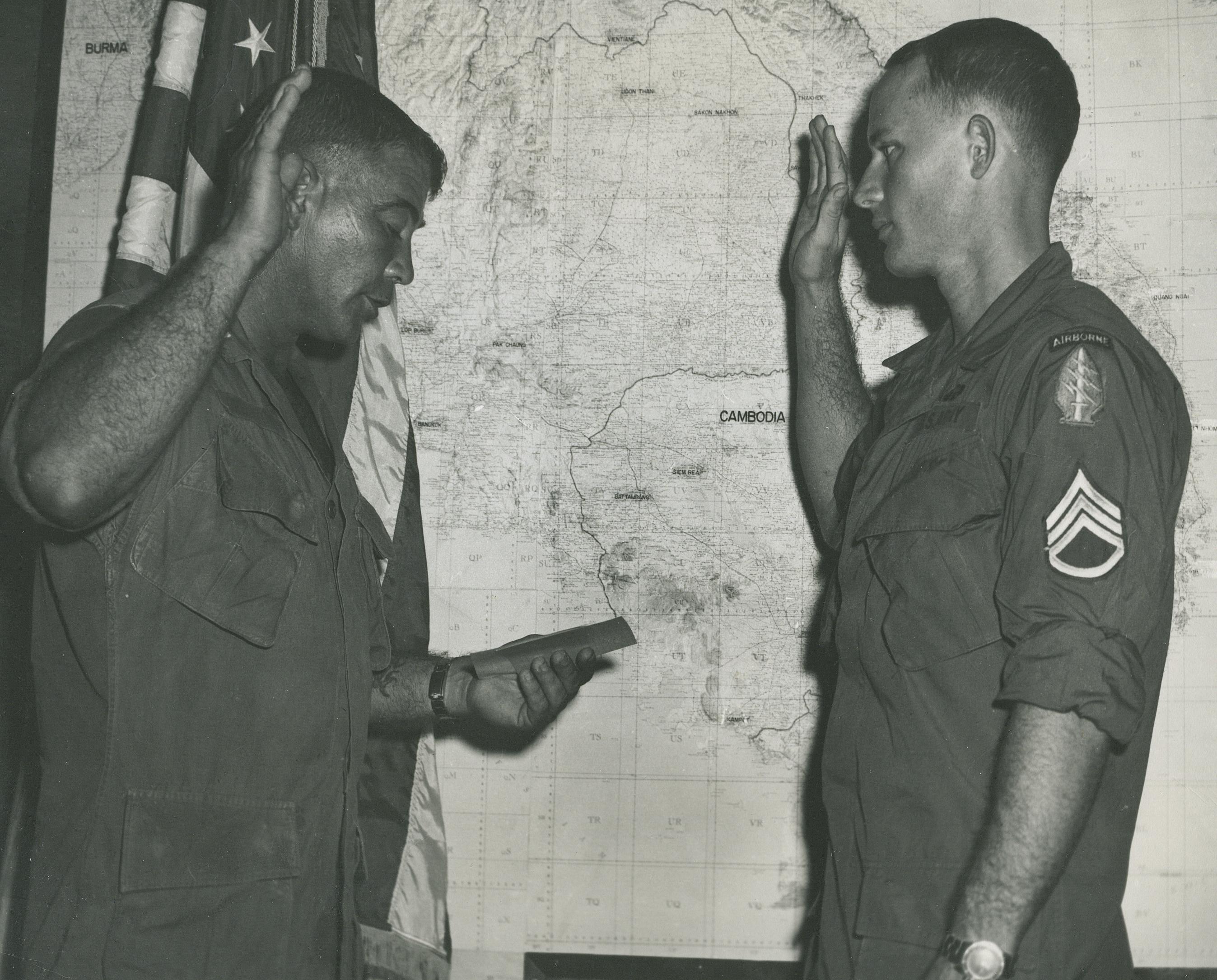 A-432 Team CPT R. Greenwood re- enlists SSG L Holmes at Company D, 1st SFGA SFOB in July 67