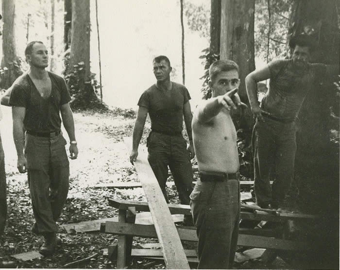 Building B-24 Base Camp, Trang South Thailand, November 1964. L-R, SSG Lonny Holmes, CPT R. Greenwood, SSG O\'Neil, SFC Knuutillia, all of A-432.