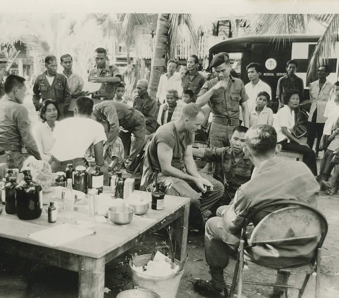 Med Cap with Thai Special Force, 1966. SGT Lonny Holmes 91B4S (18D today) There is no end to treating the poor.