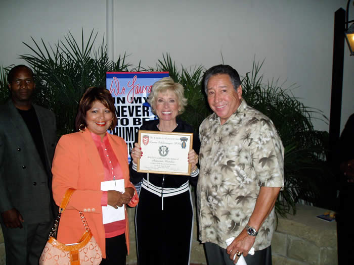 President Ramon Rodriguez and his wife Martha present a special certificate of appreciation