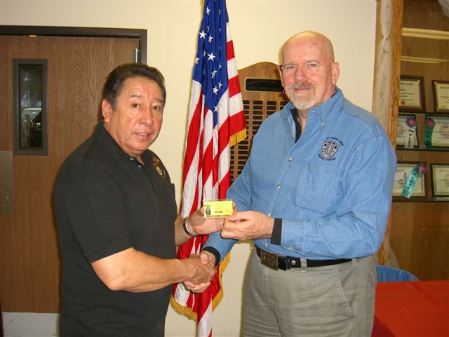 Ramon presents Life Membership card to Jim Duffy