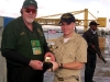 Jim Duffy presenting Chapter 78 Coin and T-Shirt to the Duty Officer for the sub commander