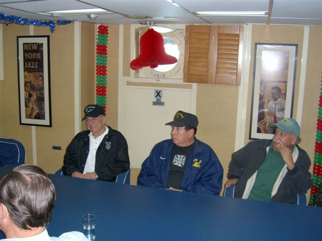 Richard Simonian, Ramon Rodriquez and Terry Cagnolatti listening to the briefing