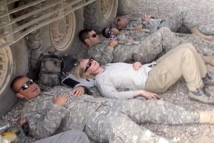 Danilenko snapped this photo of Alex Quade using her IBA as pillow for powernap in 125-degrees, between CAV & 10SFG ops, Baqubah, Iraq, June 2007. Because, he said, she was “a workaholic who rarely slept.” (Photographer Greg Danilenko, courtesy Alex Quade)