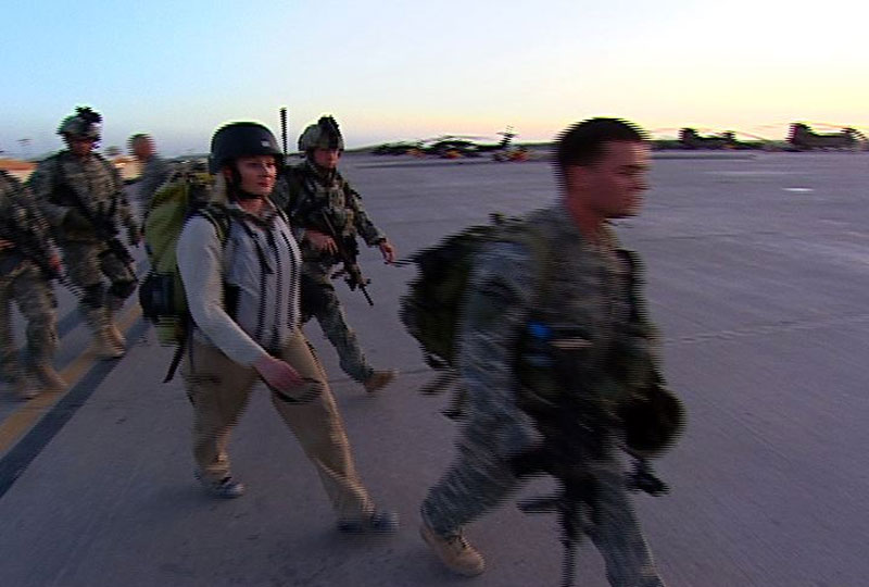 heading to CH-47 aircraft for air assault May 30, 2007, into Sangin River Valley, Helmand Province, Afghanistan. (Photographer, Greg Danilenko, courtesy Alex Quade)