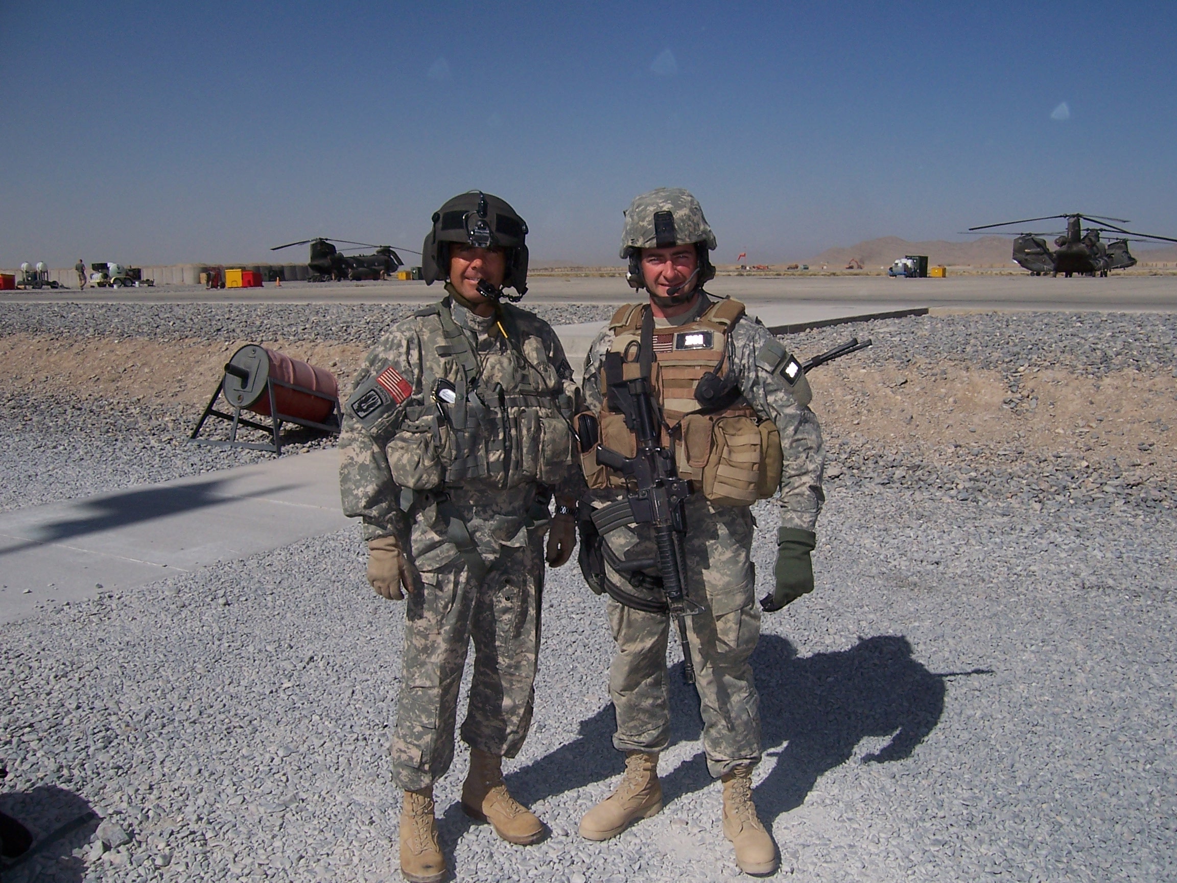 At left, LTC Brian McFadden and, right, SOTF-71 CMDR Pat Mahaney, “Flipper” CH-47 unit behind them, KAF 2007.(Courtesy Pat Mahaney)