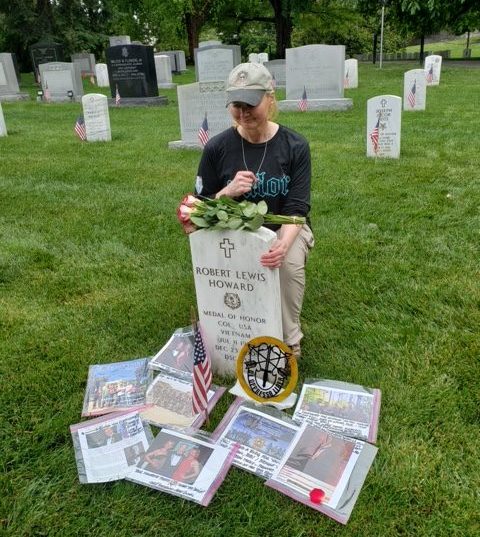 Alex pays tribute at his grave, 2021.