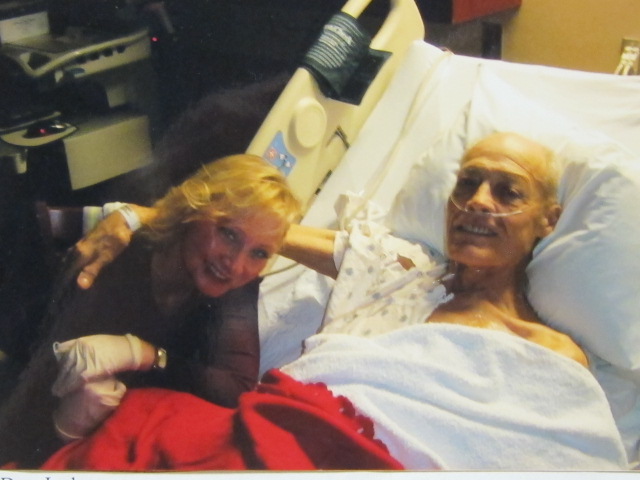 Alex Quade with Bob Howard in hospital