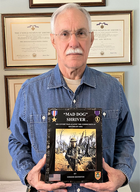 Gordon Denniston with his just completed biography of Jerry “Mad Dog” Shriver. On display at SOAR this year, a number of us put in our pre-publication orders for this well-researched and illustrated tribute to one of SOG’s most storied (and feared) warriors. (Photo courtesy G. Denniston)
