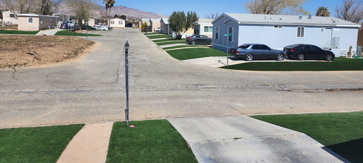 The finished green lawns add lively color and beautify the neighborhood.