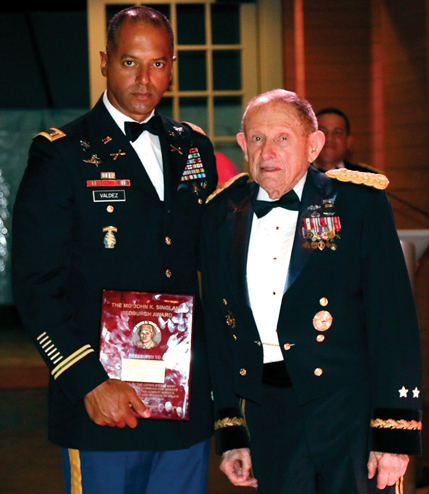 MG (Ret.) John Singlaub presents the inaugural award named after himself to CWO2 George A. Valdez, a Team Sergeant with 7th Special Forces Group (Airborne).