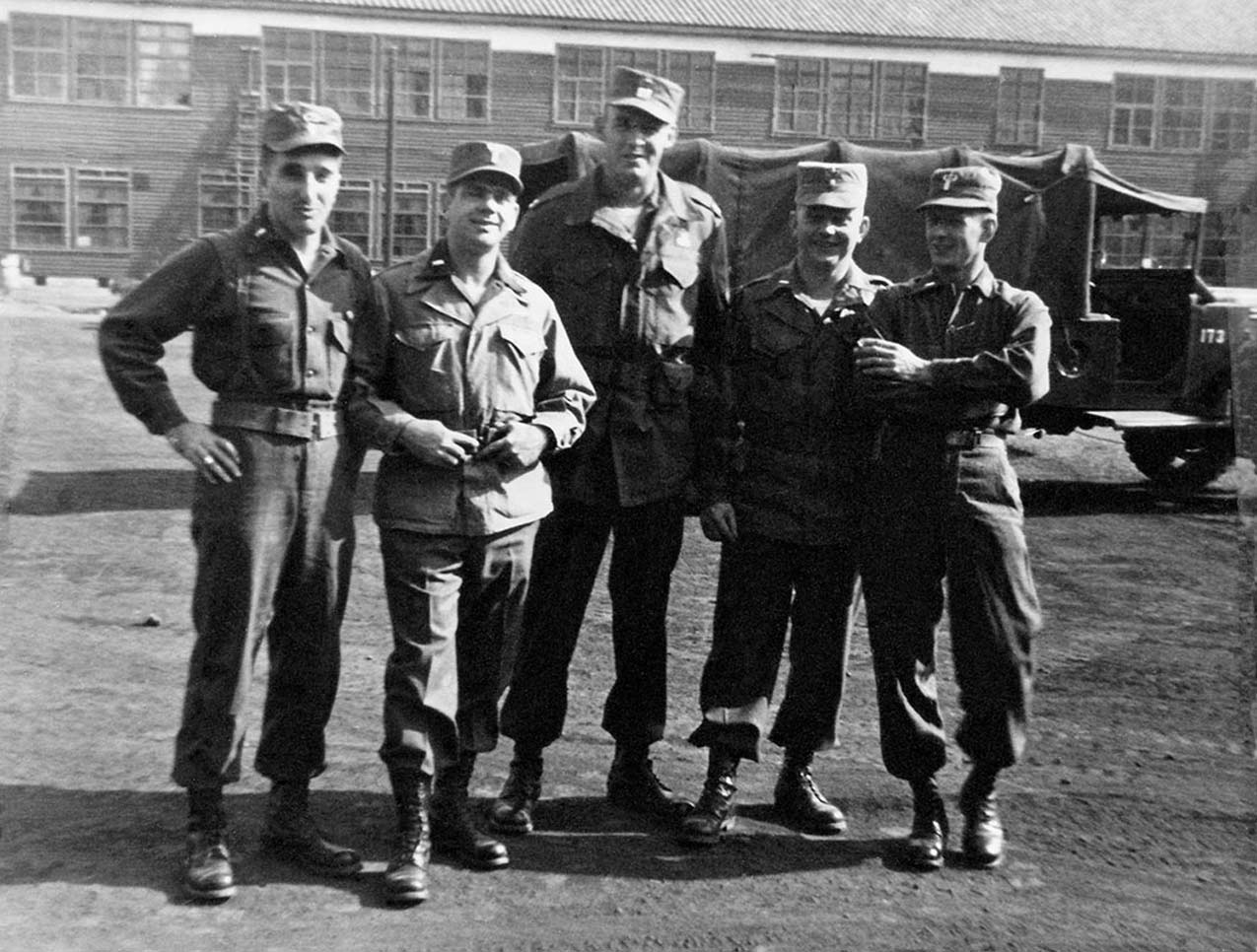 Above, 8007th personnel, left to right, 1LT Sam C. Sarkesian, 1LT Warren E. Parker, CPT Francis W. Dawson, 2LT Earl L. Thieme and 1LT Leo F. Siefert at Camp Drake, Japan. The men are graduates of Class #3 of the Special Forces Course. (U.S. Army)