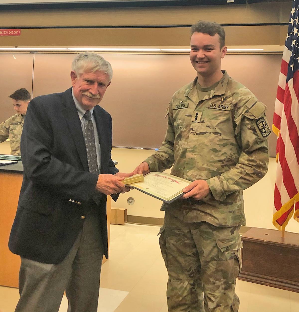 Steve Bric present USC Cadet David Gillies with the Ch 78 ROTC Award