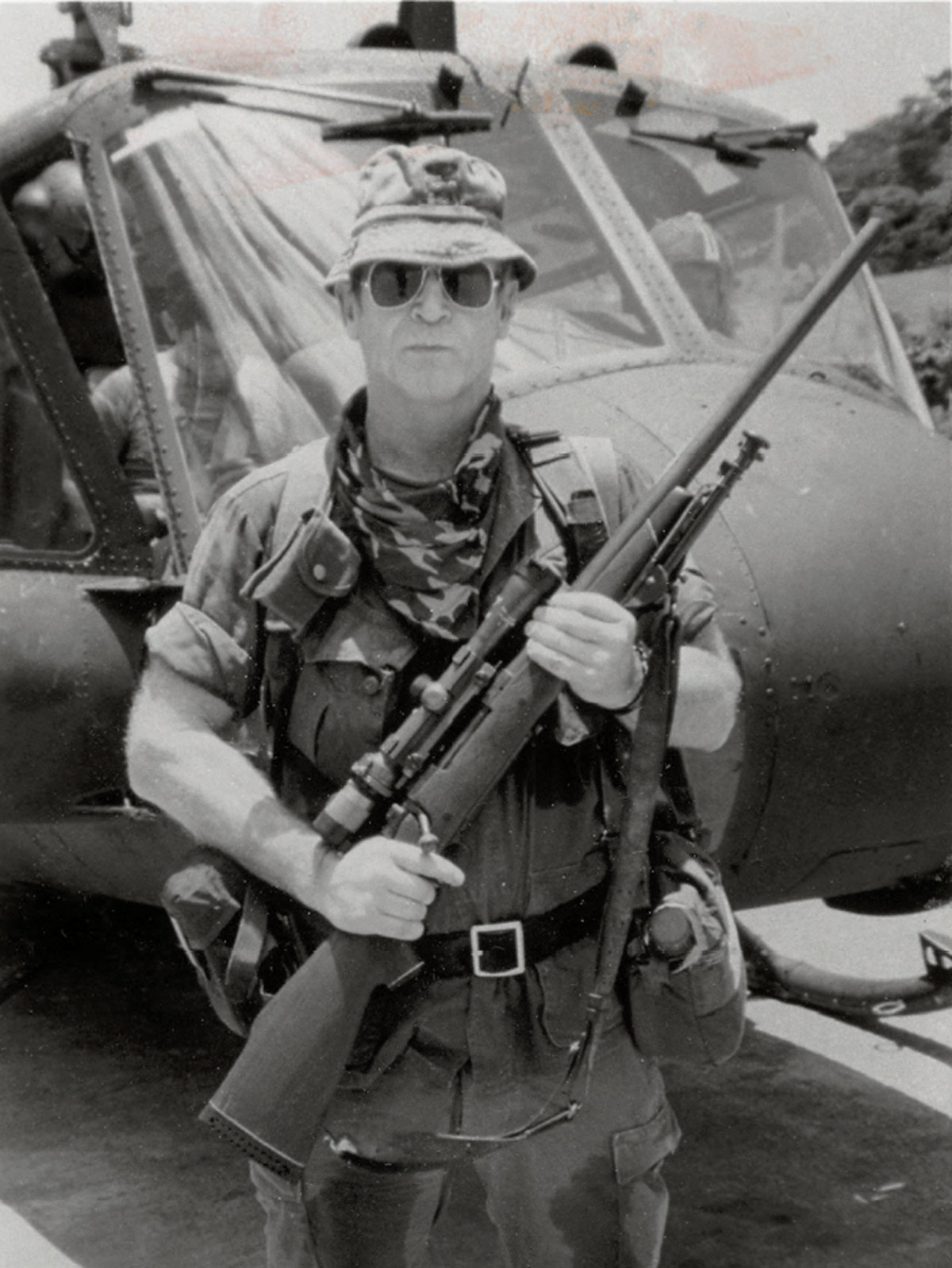 Brown in Salvador with sniper rifle (Photo courtesy RKB Collection)