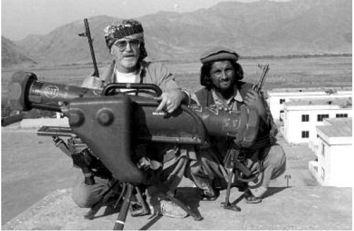 RKB, armed with a Russian Draganov sniper rifle poses with rebel Milan missile outside of Jalalabad in 1989. First photo proving the rebels had such sophisticated anti-tank systems to reach the West. (Photo courtesy SOF – RKB Collection)