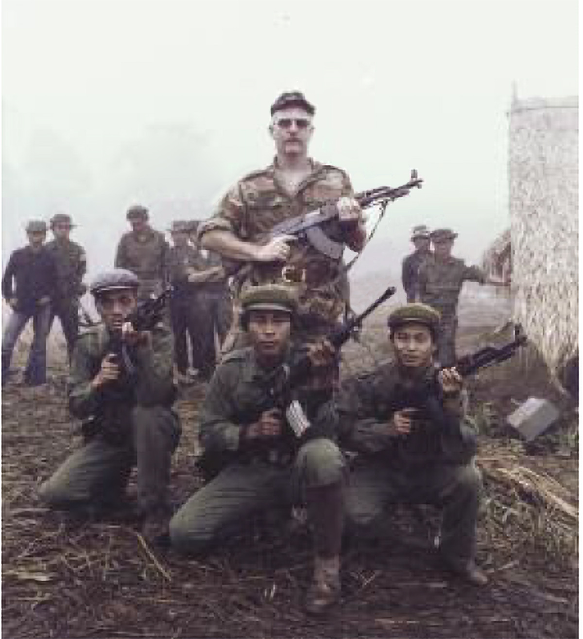 RKB at anticommunist Laotian United Liberation Front base camp inside communist Laos. At one time the camp held 125 armed Hmong who were to assist in search for American POW’s. (Photo courtesy SOF – RKB Collection)