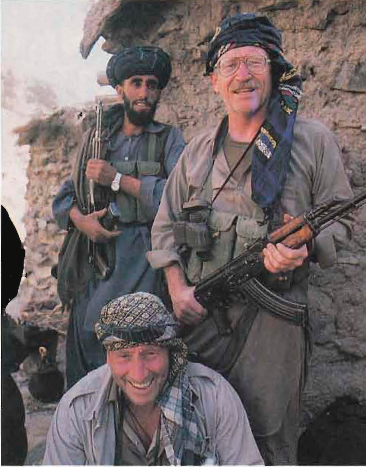 LTC Robert K. Brown in Afghanistan with an unidentified Afghan and a smiling MAJ Mike Williams. Mike joined Special Forces when it was formed, fought with UNPIK in Korea, and went on to serve as a major in three armies, U.S., Rhodesia, and Mike Hoare’s 5 Commando in the Congo. (Photo courtesy RKB Collection)