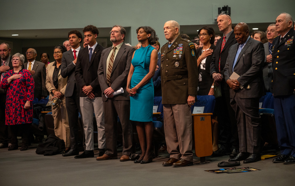 COL (Ret.) Paris Davis and his family, along with other participants, stand for the National anthem at the Medal of Honor Hall of Heroes Induction Ceremony at the Pentagon, Washington, D.C., March 6, 2023. (Photo by U.S. Air Force Tech. Sgt. Jack Sanders)