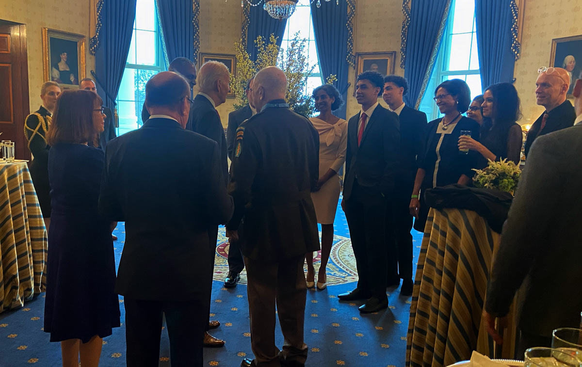 COL Davis and family speak with President Biden after the ceremony. (Photo by Vahan Sipantzi)