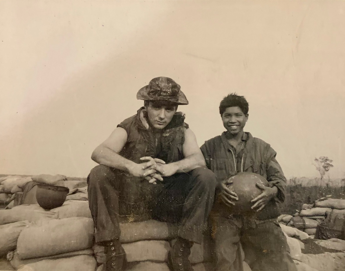 Me and my thirteen year old Brou Montagnard sanitation helper. (Photo by Robert Shippen, courtesy Denis Chericone)