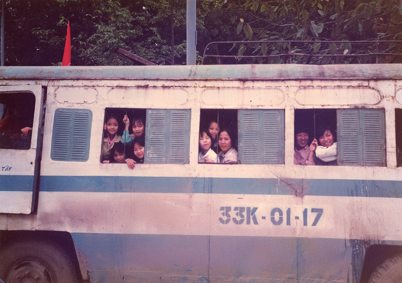 Kids on a school bus, Hanoi, 1992 (Photo by Marc Yablonka)