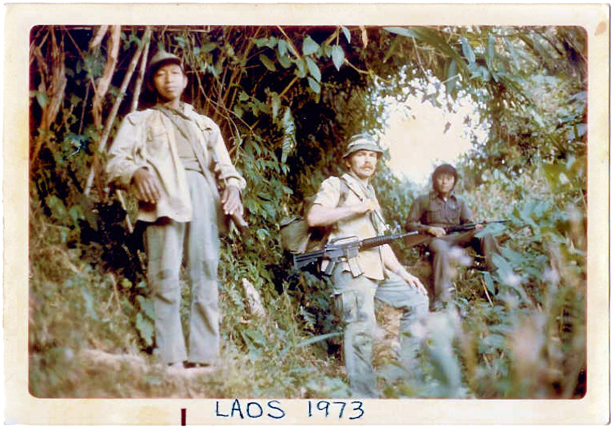 Steve Schofield with military guide (left) and Ly Chay, Chief Medic (right). (Photo by Father Lucien Bouchard. Courtesy Steve Schofield)